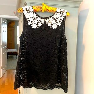 Sleeveless black lace top with flowered collar